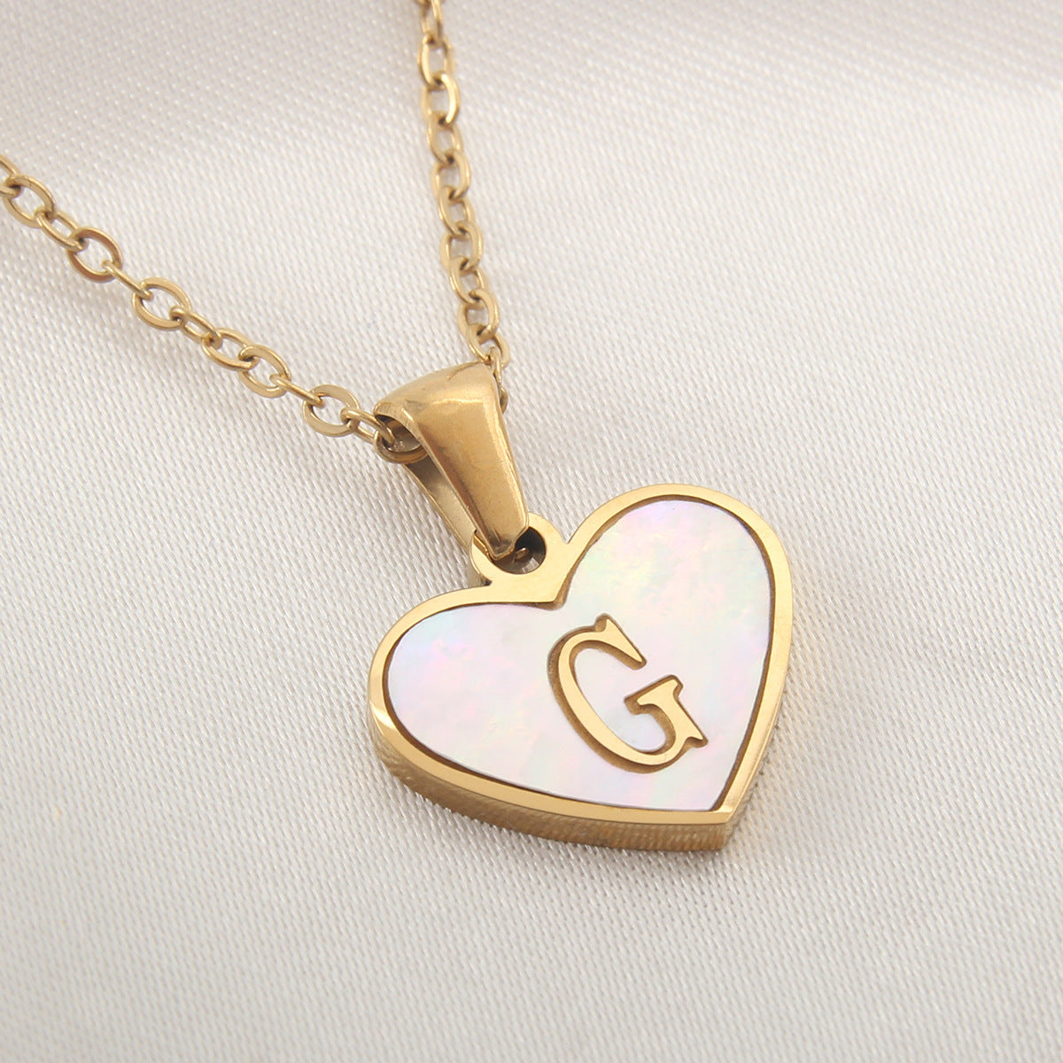 Collier cœur avec lettre personnalisée offert