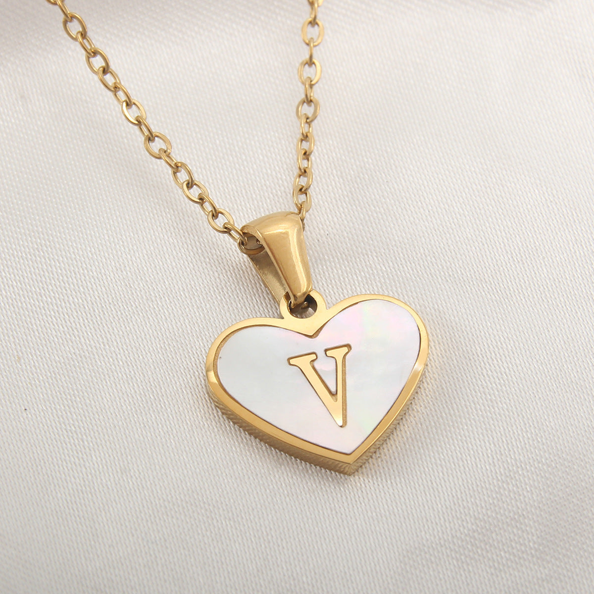 Collier cœur avec lettre personnalisée offert