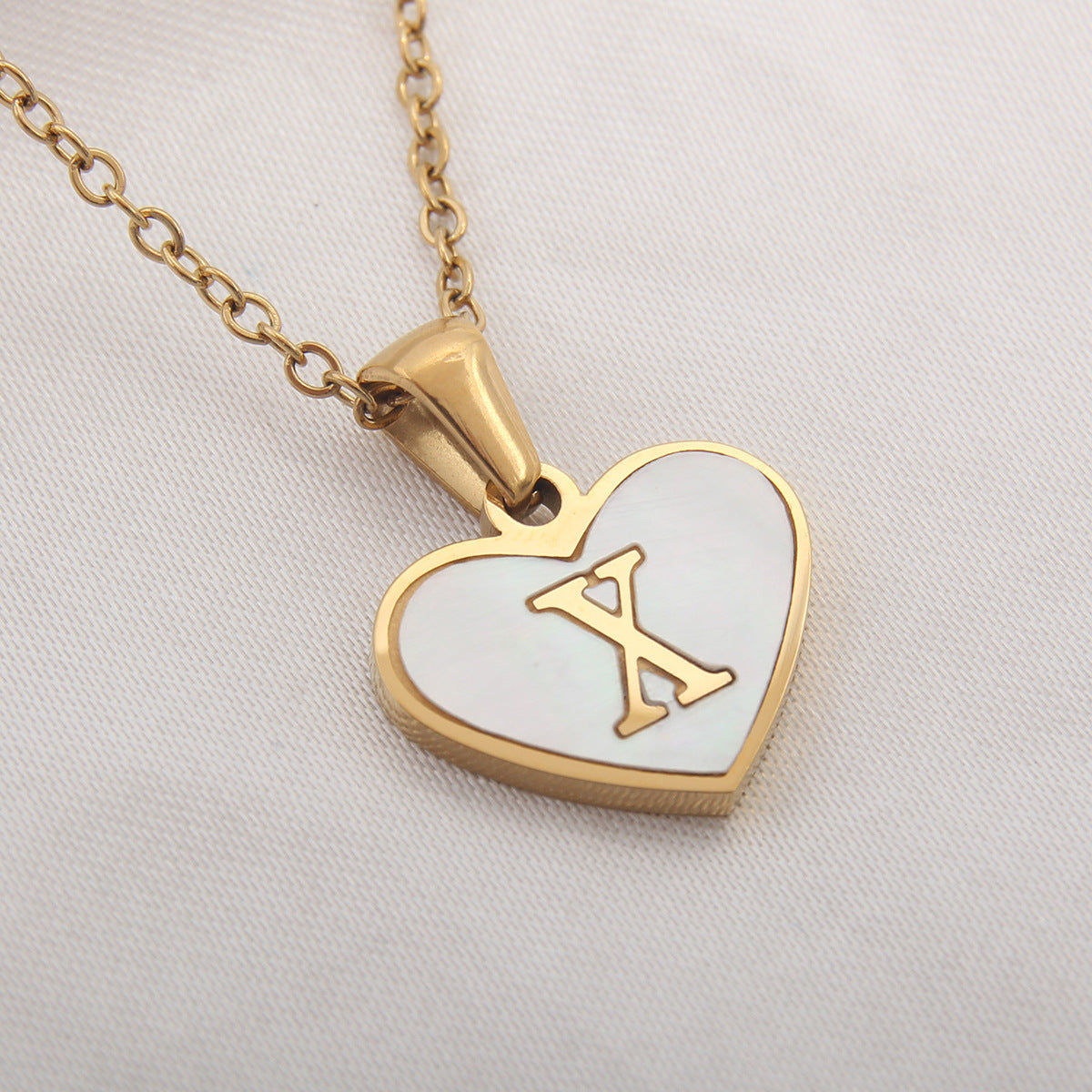 Collier cœur avec lettre personnalisée offert