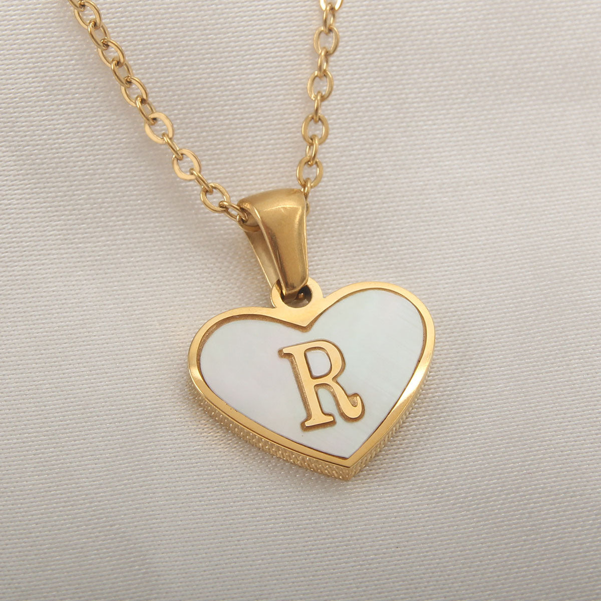 Collier cœur avec lettre personnalisée offert