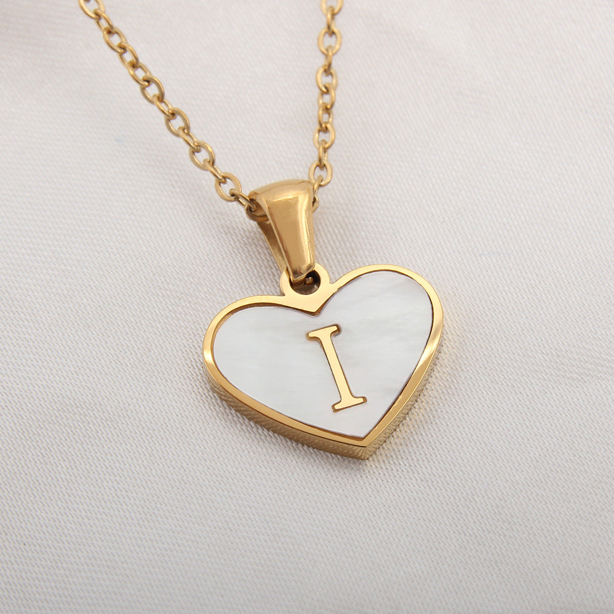 Collier cœur avec lettre personnalisée offert