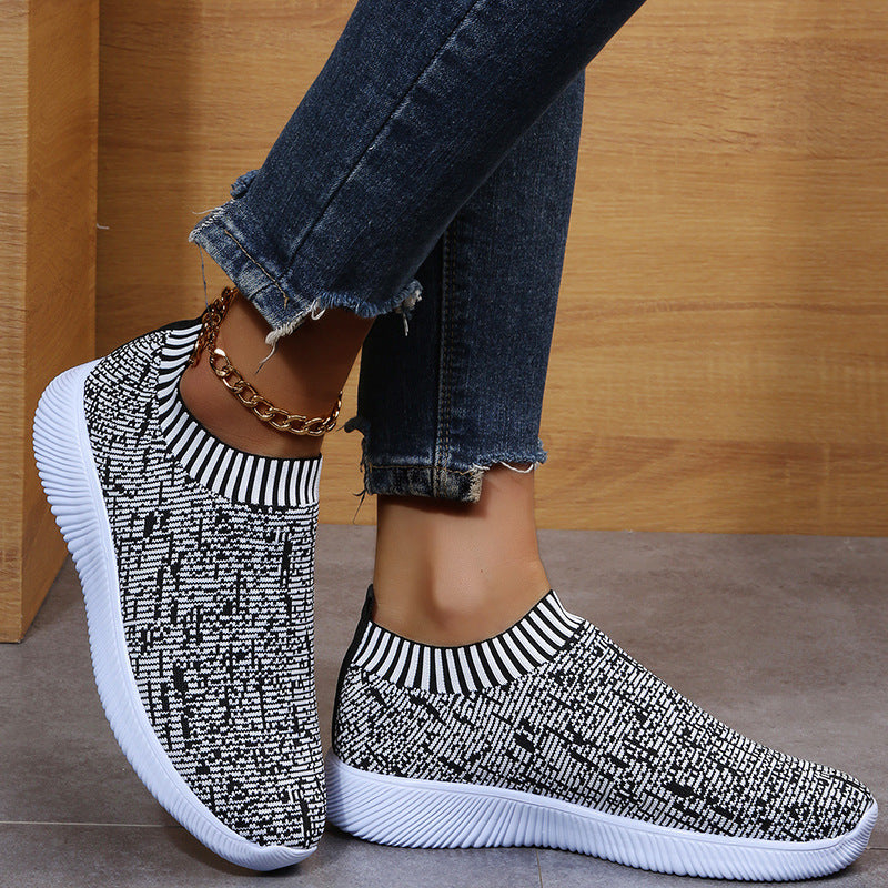 Baskets plates en chaussettes tricotées Stripe, idéales pour courir et marcher.