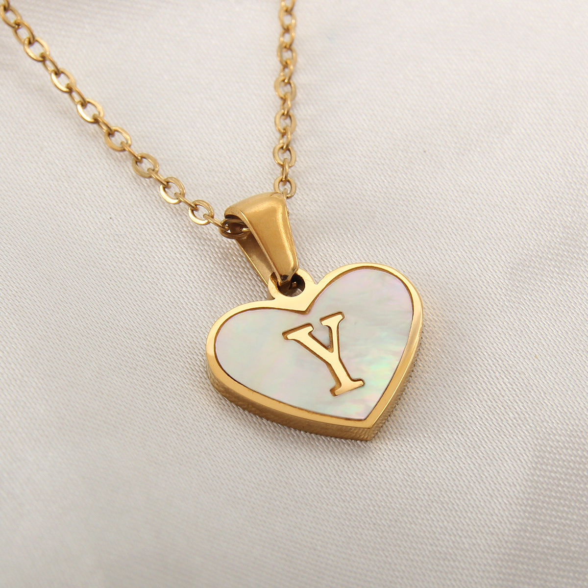 Collier cœur avec lettre personnalisée offert